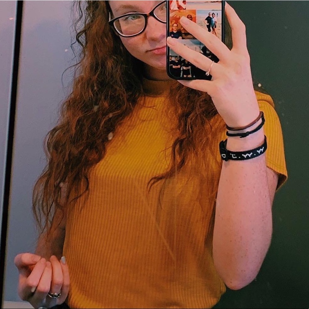 picture ^ how it looks on/ tanish yellow top